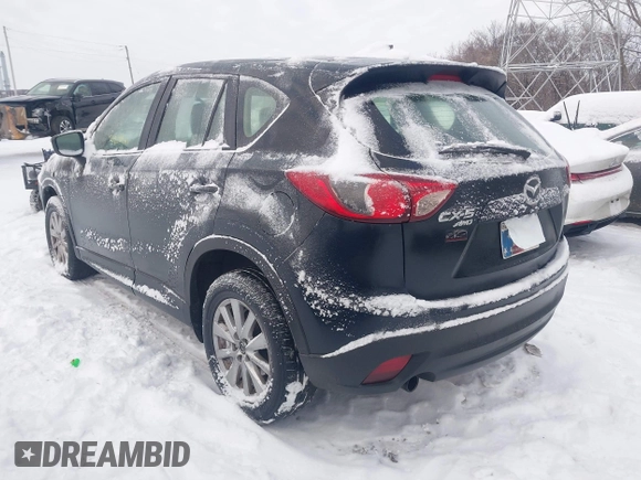 2016 Mazda CX-5 Sport z VIN JM3KE4BY0G0919017, wystawiony jako IAAI lot #41316161 z przebiegiem 209 259 mil mil oraz . Historia ofert i sprzedaży dostępna na DreamBid. Obrazek 3.