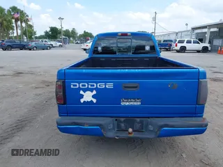 2000 Dodge Dakota z VIN 1B7FL26X1YS799143, wystawiony jako IAAI lot #42303206 z przebiegiem 148 576 mil mil oraz . Historia ofert i sprzedaży dostępna na DreamBid. Obrazek 16.
