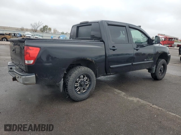 2014 Nissan Titan Pro-4X with VIN 1N6AA0EC3EN514744, listed as a Copart auction lot 80469314 with 191,780 mi miles and Salvage title. Bid and sale history available at DreamBid. Image 3.