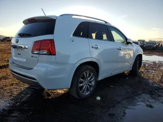 2012 Kia Sorento SX with VIN 5XYKWDA22CG243211, listed as a Copart auction lot 80150294 with 125,620 mi miles and Salvage Title. Bid and sale history available at carsss.com. Image 3.