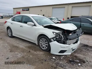 2016 Nissan Altima S z VIN 1N4AL3AP2GC239119, wystawiony jako IAAI lot #41533149 z przebiegiem 127 552 mil mil oraz . Historia ofert i sprzedaży dostępna na DreamBid. Obrazek 1.