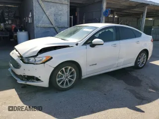 2017 Ford Fusion Hybrid SE z VIN 3FA6P0LU8HR381067, wystawiony jako Copart lot #60173255 z przebiegiem 76 046 mil mil oraz Szkoda całkowita • Salvage title. Historia ofert i sprzedaży dostępna na DreamBid. Obrazek 1.