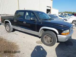 2003 Dodge Dakota SLT with VIN 1D7HL48X93S151422, listed as a IAAI auction lot 40661577 with 238,586 mi miles. Bid and sale history available at carsss.com. Image 1.