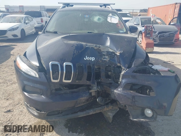 2015 Jeep Cherokee Latitude with VIN 1C4PJLCB9FW683459, listed as a IAAI auction lot 41998309 with 176,769 mi miles and . Bid and sale history available at carsss.com. Image 6.