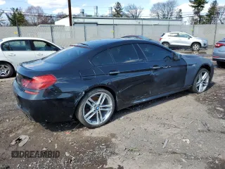 2015 BMW 6 Series 640i with VIN WBA6A0C5XFD318947, listed as a Copart auction lot 50228615 with 78,202 mi miles and Salvage Title. Bid and sale history available at carsss.com. Image 3.