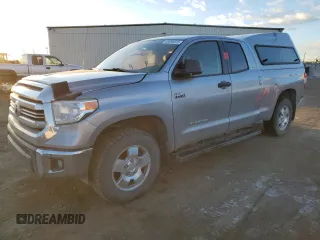 2017 Toyota Tundra SR z VIN 5TFUY5F14HX626659, wystawiony jako Copart lot #89096825 z przebiegiem Nie podano mil oraz Szkoda całkowita • Salvage title. Historia ofert i sprzedaży dostępna na DreamBid. Obrazek 1.