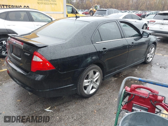 2012 Ford Fusion SPORT with VIN 3FAHP0KC0CR176529, listed as a IAAI auction lot 40971678 with 164,121 mi miles. Bid and sale history available at carsss.com. Image 4.