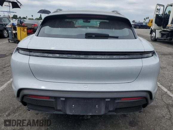 2023 Porsche Taycan 4 with VIN WP0BA2Y13PSA60032, listed as a Copart auction lot 68658963 with 4,572 mi miles and . Bid and sale history available at DreamBid. Image 6.