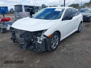2018 Honda Civic LX with VIN 2HGFC2F5XJH603214, listed as a IAAI auction lot 41788384 with 114,876 mi miles and . Bid and sale history available at carsss.com. Image 2.