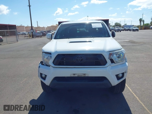 2014 Toyota Tacoma PreRunner z VIN 3TMJU4GN8EM160522, wystawiony jako IAAI lot #42207788 z przebiegiem 103 361 mil mil oraz . Historia ofert i sprzedaży dostępna na DreamBid. Obrazek 12.