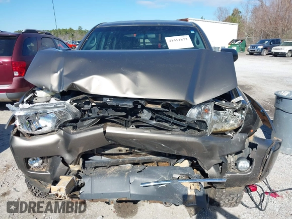 2014 Toyota Tacoma with VIN 5TFLU4EN4EX107161, listed as a IAAI auction lot 41411872 with 134,273 mi miles. Bid and sale history available at carsss.com. Image 6.