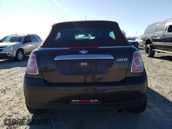 2012 MINI Convertible with VIN WMWZN3C55CT133967, listed as a Copart auction lot 88546705 with 104,357 mi miles and Non repairable. Bid and sale history available at DreamBid. Image 6.