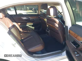 2018 BMW 7 Series 750i with VIN WBA7F0C57JGM23667, listed as a IAAI auction lot 41581035 with 113,140 mi miles and . Bid and sale history available at DreamBid. Image 8.