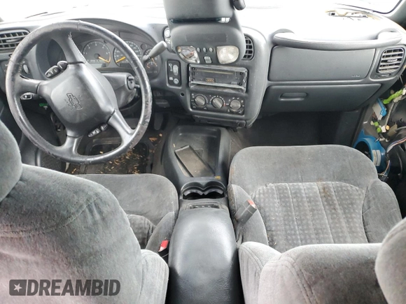 1999 Chevrolet Blazer Trailblazer z VIN 1GNDT13W9X2238417, wystawiony jako Copart lot #80087223 z przebiegiem Nie podano mil oraz Szkoda całkowita • Salvage title. Historia ofert i sprzedaży dostępna na DreamBid. Obrazek 8.