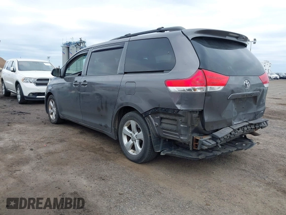 2012 Toyota Sienna XLE AAS with VIN 5TDYK3DC0CS252965, listed as a IAAI auction lot 42059909 with 321,983 mi miles and . Bid and sale history available at carsss.com. Image 3.