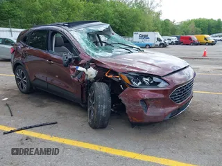 2021 Ford Escape SE Hybrid with VIN 1FMCU9BZ9MUA15592, listed as a IAAI auction lot 42261312 with 56,525 mi miles and . Bid and sale history available at DreamBid. Image 1.