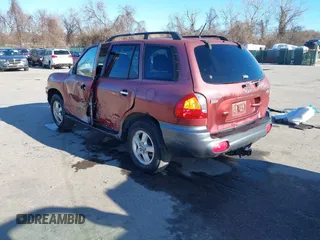 2004 Hyundai Santa Fe GLS with VIN KM8SC13EX4U798868, listed as a IAAI auction lot 41835652 with 222,350 mi miles. Bid and sale history available at carsss.com. Image 3.