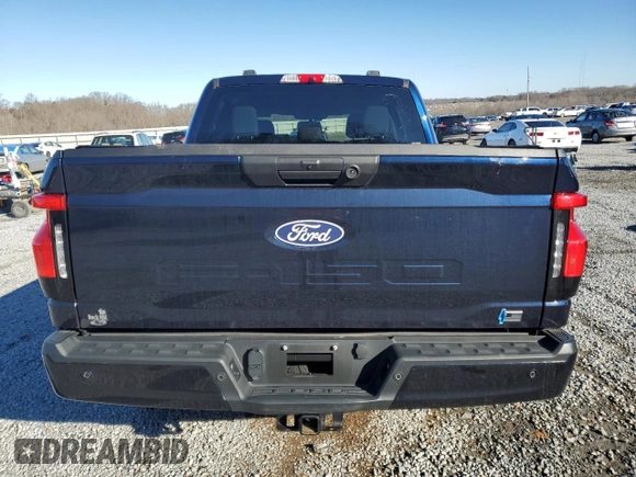 2024 Ford F-150 Lightning XLT with VIN 1FTVW3LK1RWG18473, listed as a Copart auction lot 86523084 with 6,824 mi miles and Salvage title. Bid and sale history available at DreamBid. Image 6.
