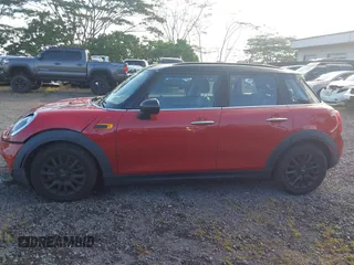 2015 MINI Hardtop 4 Door z VIN WMWXS5C57F2C63418, wystawiony jako IAAI lot #41938785 z przebiegiem 101 712 mil mil oraz . Historia ofert i sprzedaży dostępna na DreamBid. Obrazek 14.