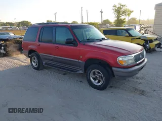 1997 Mercury Mountaineer z VIN 4M2DU55P0VUJ62553, wystawiony jako IAAI lot #41874427 z przebiegiem 79 221 mil mil oraz . Historia ofert i sprzedaży dostępna na DreamBid. Obrazek 1.