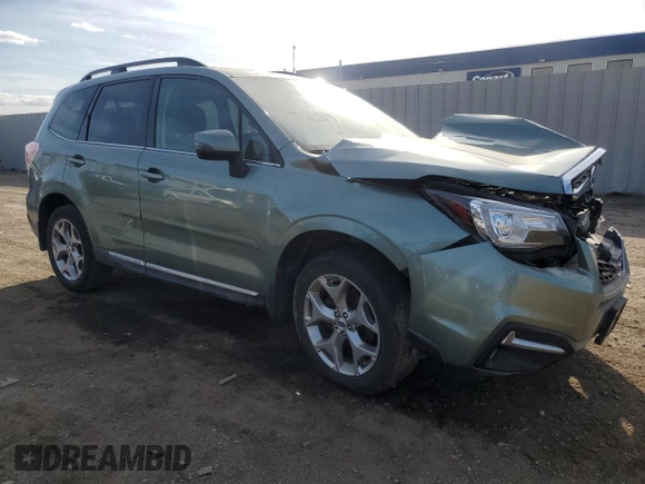 2017 Subaru Forester Touring with VIN JF2SJAWC8HH577564, listed as a Copart auction lot 50696055 with 90,365 mi miles and Salvage Title. Bid and sale history available at DreamBid. Image 4.