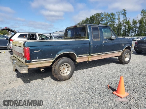 1994 Ford F-150 with VIN 1FTEX14H1RKB75298, listed as a Copart auction lot 64775735 with 227,601 mi miles and Clean title. Bid and sale history available at DreamBid. Image 3.