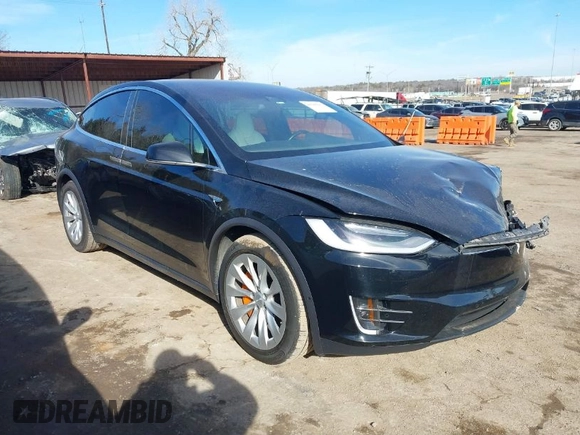 2018 Tesla Model X 75D with VIN 5YJXCDE44JF091690, listed as a IAAI auction lot 41585617 with 128,826 mi miles and . Bid and sale history available at DreamBid. Image 1.