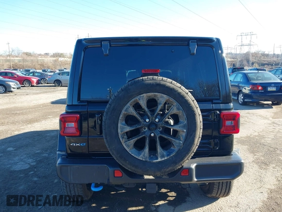 2024 Jeep Wrangler Sahara with VIN 1C4RJXP62RW126989, listed as a IAAI auction lot 41816525 with 11,241 mi miles and . Bid and sale history available at DreamBid. Image 17.