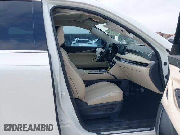 2023 Infiniti QX60 Luxe with VIN 5N1DL1FS0PC356315, listed as a IAAI auction lot 42177668 with 30,690 mi miles and . Bid and sale history available at DreamBid. Image 5.