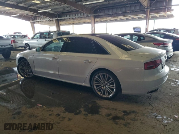 2017 Audi A8 with VIN WAU44AFD2HN009512, listed as a Copart auction lot 84442474 with 44,174 mi miles and Salvage title. Bid and sale history available at DreamBid. Image 2.
