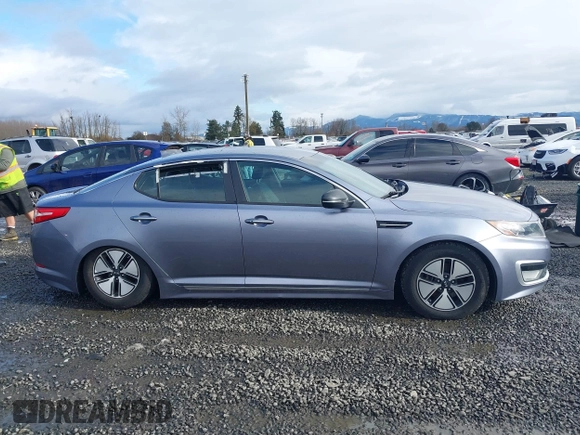 2012 Kia Optima Hybrid with VIN KNAGM4AD5C5022673, listed as a IAAI auction lot 41506860 with 121,982 mi miles. Bid and sale history available at carsss.com. Image 14.