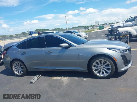 2023 Cadillac CT5 Luxury z VIN 1G6DW5RK3P0106764, wystawiony jako IAAI lot #42491584 z przebiegiem 32 223 mil mil oraz . Historia ofert i sprzedaży dostępna na DreamBid. Obrazek 13.