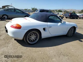 1999 Porsche Boxster с VIN WP0CA2981XU626335, выставлен на аукционе Copart как лот 58570495 с пробегом 140 751 миль миль и Списание • Salvage title. История ставок и продаж доступна на DreamBid. Изображение 3.
