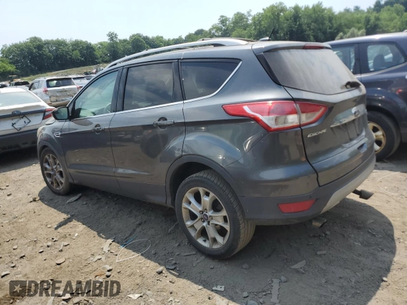 2016 Ford Escape Titanium with VIN 1FMCU9JX8GUB85463, listed as a Copart auction lot 58013684 with 147,620 mi miles and Salvage Title. Bid and sale history available at carsss.com. Image 2.