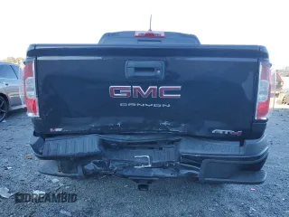 2021 GMC Canyon 4WD AT4 w/Cloth with VIN 1GTG6FEN5M1100096, listed as a Copart auction lot 77535584 with 25,152 mi miles and Salvage Title. Bid and sale history available at carsss.com. Image 6.