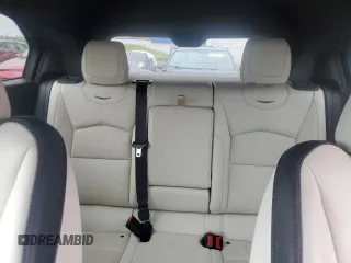 2022 Cadillac XT4 AWD Sport с VIN 1GYFZFR46NF170841, выставлен на аукционе Copart как лот 55863705 с пробегом 14 745 миль миль и Списание • Salvage title. История ставок и продаж доступна на DreamBid. Изображение 10.