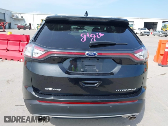 2015 Ford Edge Titanium z VIN 2FMTK3K87FBC06852, wystawiony jako IAAI lot #42335238 z przebiegiem 187 256 mil mil oraz . Historia ofert i sprzedaży dostępna na DreamBid. Obrazek 16.