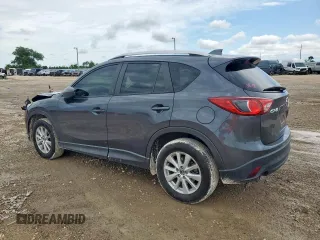 2014 Mazda CX-5 Touring z VIN JM3KE2CY7E0308580, wystawiony jako Copart lot #60565835 z przebiegiem 92 708 mil mil oraz Szkoda całkowita • Salvage title. Historia ofert i sprzedaży dostępna na DreamBid. Obrazek 2.