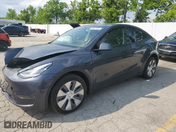 2023 Tesla Model Y Long Range z VIN 7SAYGDEE2PA041350, wystawiony jako Copart lot #56657005 z przebiegiem 25 090 mil mil oraz Szkoda całkowita • Salvage title. Historia ofert i sprzedaży dostępna na DreamBid. Obrazek 1.