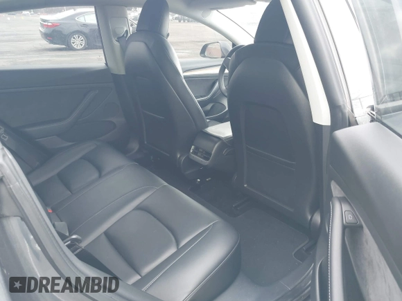2022 Tesla Model 3 Long Range with VIN 5YJ3E1EB9NF206943, listed as a IAAI auction lot 41911040 with 69,920 mi miles and . Bid and sale history available at DreamBid. Image 8.