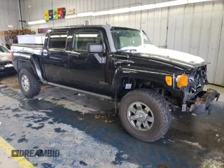 2009 Hummer H3 with VIN 5GNEN13EX98140981, listed as a Copart auction lot 87460374 with 111,362 mi miles and Salvage Title. Bid and sale history available at DreamBid. Image 4.