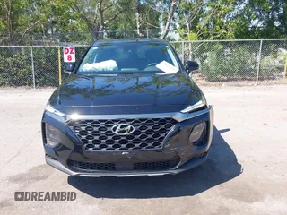 2019 Hyundai Santa Fe SE with VIN 5NMS23AD4KH088902, listed as a IAAI auction lot 42044465 with 34,302 mi miles and . Bid and sale history available at DreamBid. Image 12.