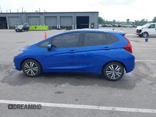 2016 Honda Fit EX z VIN JHMGK5H71GX041650, wystawiony jako IAAI lot #42658304 z przebiegiem 142 904 mil mil oraz . Historia ofert i sprzedaży dostępna na DreamBid. Obrazek 14.