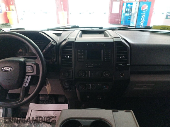 2020 Ford F-150 XL with VIN 1FTEX1EP1LKE45885, listed as a IAAI auction lot 42679224 with 124,413 mi miles and . Bid and sale history available at DreamBid. Image 3.