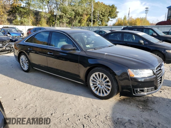 2015 Audi A8 z VIN WAUJGAFD7FN032176, wystawiony jako Copart lot #76943904 z przebiegiem 126 423 mil mil oraz Czysty tytuł • Clean title. Historia ofert i sprzedaży dostępna na DreamBid. Obrazek 4.