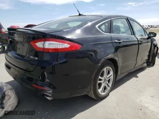 2016 Ford Fusion Energi Titanium with VIN 3FA6P0SU3GR229505, listed as a Copart auction lot 47242442 with 72,700 mi miles. Bid and sale history available at carsss.com. Image 4.