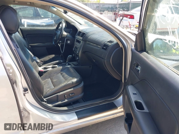 2012 Ford Fusion SEL with VIN 3FAHP0JA7CR295078, listed as a IAAI auction lot 42152639 with 162,887 mi miles. Bid and sale history available at carsss.com. Image 5.