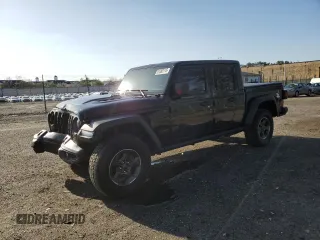 2020 Jeep Gladiator Rubicon z VIN 1C6JJTBG9LL184085, wystawiony jako Copart lot #51382115 z przebiegiem 83 375 mil mil oraz Szkoda całkowita • Salvage title. Historia ofert i sprzedaży dostępna na DreamBid. Obrazek 1.