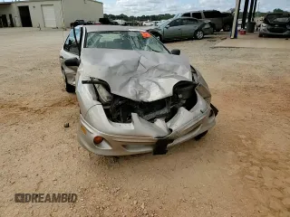 2002 Pontiac Sunfire SE z VIN 1G2JB524027308408, wystawiony jako Copart lot #61752784 z przebiegiem Nie podano mil oraz Szkoda całkowita • Salvage title. Historia ofert i sprzedaży dostępna na DreamBid. Obrazek 10.