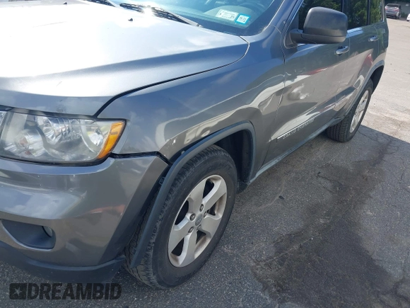 2011 Jeep Grand Cherokee Laredo with VIN 1J4RR4GG7BC736694, listed as a IAAI auction lot 42758461 with 159,875 mi miles and . Bid and sale history available at DreamBid. Image 6.